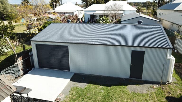 Garages & Sheds - 3 bay garage horizontal cladding and eaves